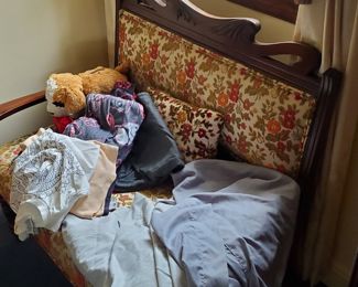 Some clothing hiding in closets..  and Gorgeous Eastlake settee 