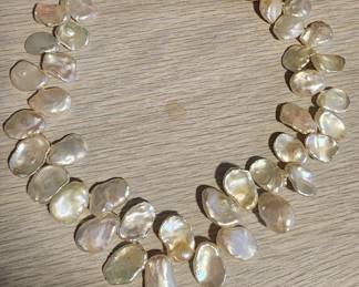 Mother of pearl and sterling necklace.