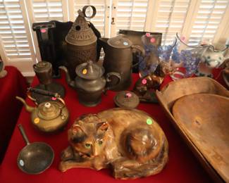 Pewter ($5-25), cast iron and brass ($5-25), cat door stop ($50), woodenware ($25)