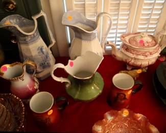 Transferware pitchers ($25), carnival glass ($25), porcelain ($10-25)