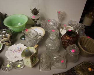 Stoneware ($5-10), porcelain  and glass ($1-10), antique pewter ($25), oil lamp ($10), Jadeite bowl ($400)