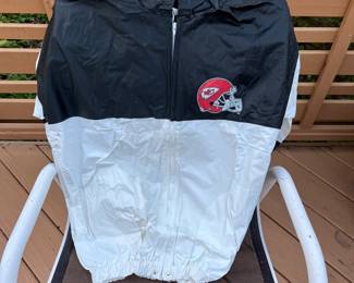 Size large Kansas City Cheif’s pull over rain jacket.