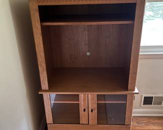 Wooden hutch fits 34 inch TV.
