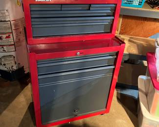 Stack on mechanics tool chest on wheels.
