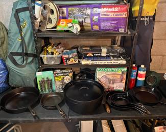 Large variety of Wagner iron pans, griddles and footed dutch oven.