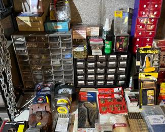 Multi drawer Hardware storage, tape measures, folding ruler, picture hanging hardware helping magnifier and much more.