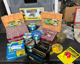 Storage boxes, fishing line and sinkers.