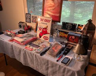 Marboro Miles punching bag, wireless phone charger, hunting knife and sheath and much more.