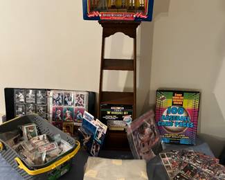 Collectible baseball cards, baseball card protectors, starting lineup figurines and matchbox cars.