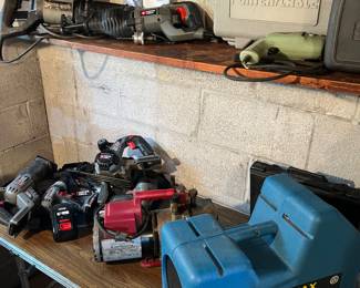 Recovery machine with digital scales and gauges, vacuum pump, two porter cable reciprocal saws and Porter cable accessory package including circular saw, reciprocal saw, drill, flashlight and carry in bag.