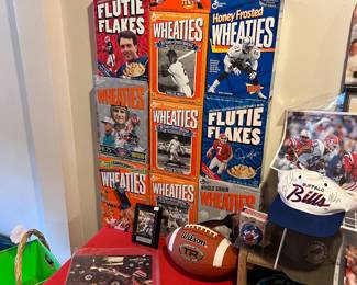 Wheaties sport boxes, bumper stickers, football and bills autographed cap.