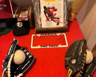 To brand new baseball gloves, softballs and sports hero scorecards.