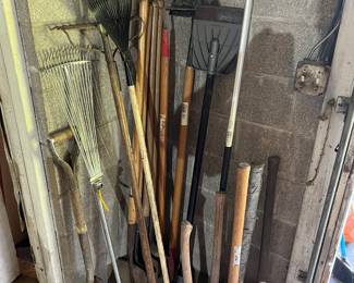 Sledge hammers, pickaxes, rakes, hoe, shovels and axes.