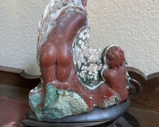 stone carving - nude bathing figures