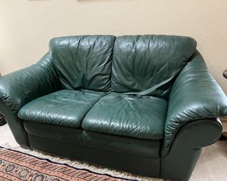 green leather loveseat and matching sofa