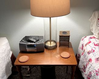 Nightstand/side table with lamp.
