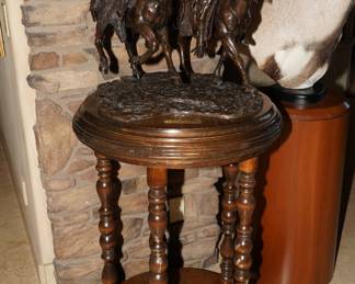 War Pony bronze by Sid Burns.  This bronze comes with a rotating barley twist wood pedestal stand as well. 