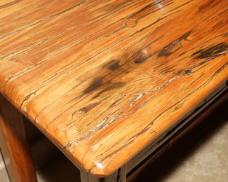 There are several mesquite tables throughout the home and all in incredible condition. 