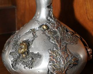 African relief vase by Roberts