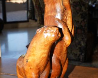 Wood carved otters sculpture by J. Chester
