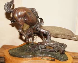 "Bronc Buster Busted" bronze by Sid Burns