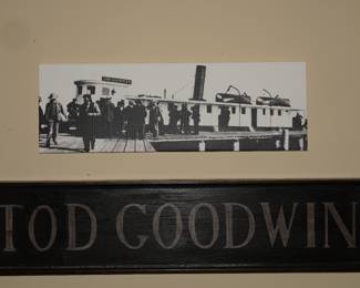 Black & white photo of the Tod Goodwin and genuine 6ft long wooden Tod Goodwin boat sign