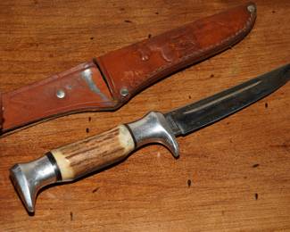 Carved staghorn knife with leather sheath