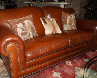Custom leather sofa with hobnail accents