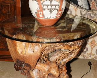 Genuine mesquite log glass topped end table with a large polychrome Helen Gachupin, Zia Pueblo, pottery vessel.  The vessel is about 14" tall x 12" diameter.