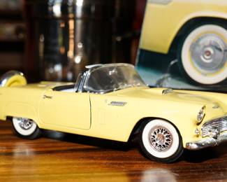 There are several cast iron and collectible cars available for sale.  