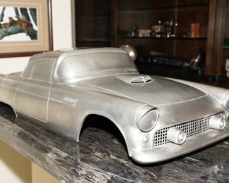 Stainless steel welded Ford Thunderbird car shell-about 4ft long.  When doing research, it was nearly impossible to find a comparable item for pricing purposes. 