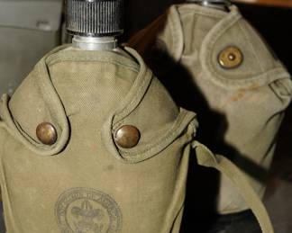 Vintage metal cross strap canteens