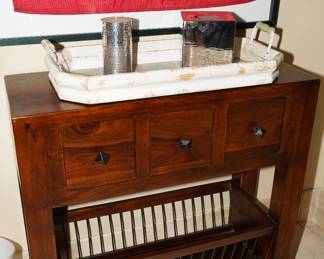 Dark wood magazine rack side table