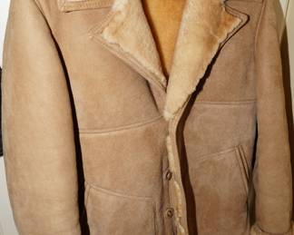 Overland suede and shearling jacket.  This jacket is brand new and was originally $800.00 when purchased. 