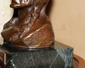 The signature of CM Russell on the side of this lost wax bronze. 