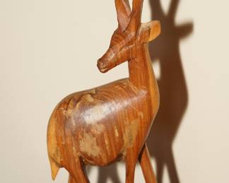 Carved wood deer
