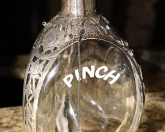 Vintage Haig "Pinch" decanter with sterling overlay