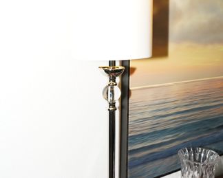 There are two of these cylindrical chrome & lucite table lamps available.