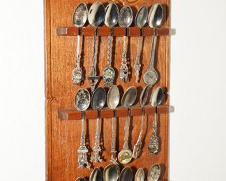 18 vintage miniature spoons on wood wall display