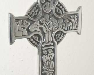 There are many pewter crosses available throughout the home.