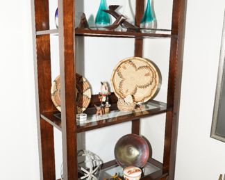 There are several Native American baskets available as well as some Santa Clara pottery and vintage Brazilian ironwood sculptures