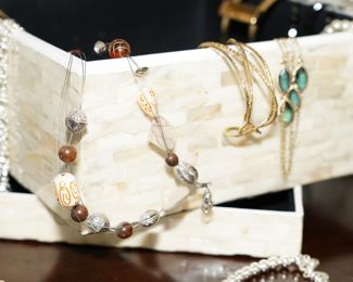 There is a significant amount of beautiful costume jewelry available, including Kendra Scott.