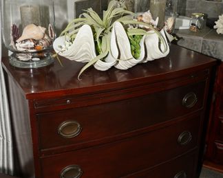 Conch shell bowl & hurricanes on a vintage 3 drawer cabinet. Conch from Pottery Barn, Hurricanes from Crate & Barrel