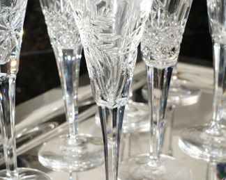 There are several pair of Waterford Crystal Millennium champagne flutes for sale-being sold as a set of 2, in different designs.