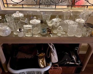 Crystal and glass, along with purses and make-up bags