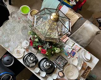 Lots of dinnerware and crystal