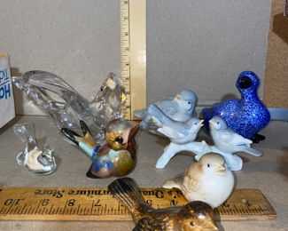 8 Bird Figurines $24.00