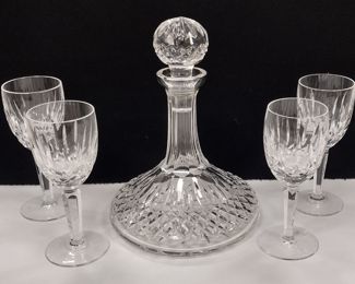 SET OF FOUR WATERFORD CRYSTAL LISMORE 6.5" WINE GOBLETS AND AN UNMARKED DECANTER