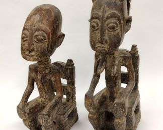 PAIR OF AFRICAN CARVINGS OF SEATED FIGURES