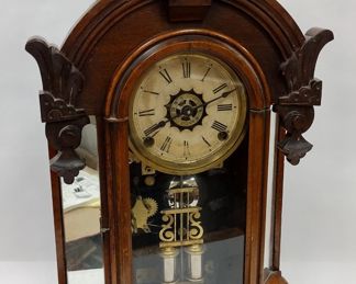 ANSONIA WALNUT CLOCK. Missing to side finials near mirrors